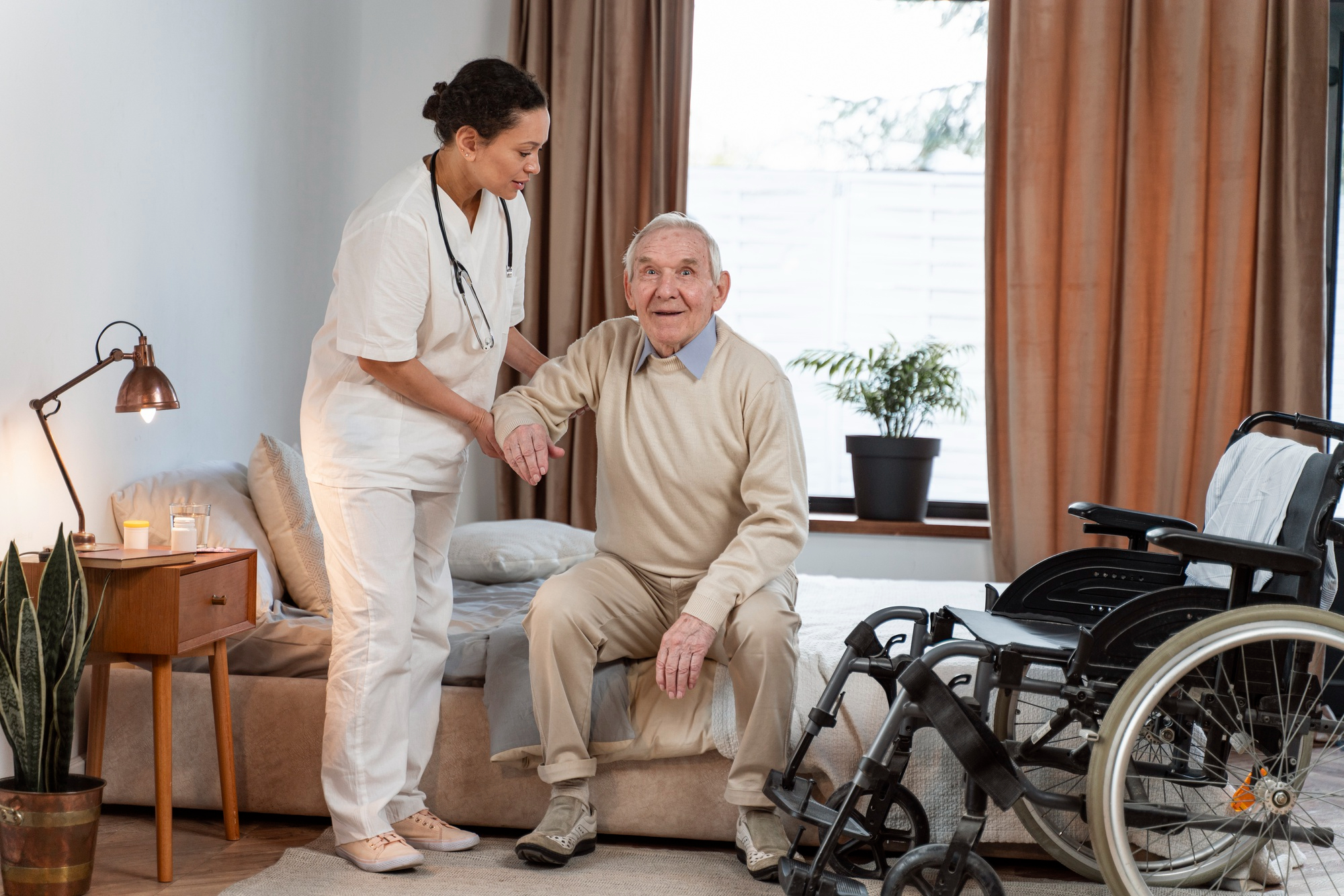 female caregiver taking care of older adult